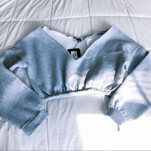 off the shoulder cropped gray sweatshirt